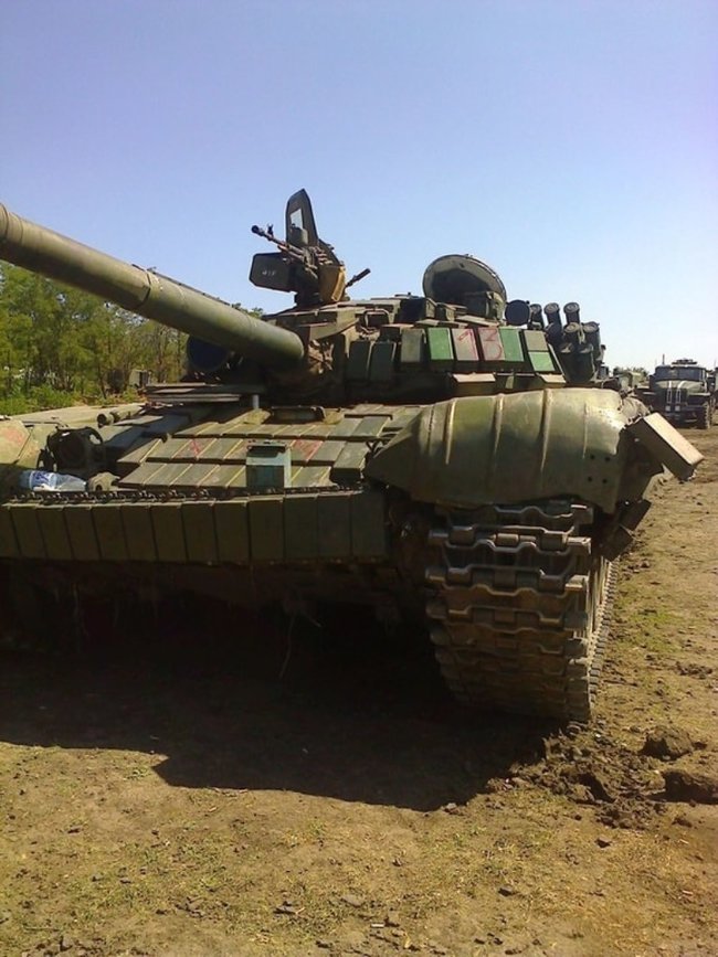Украинские воины в 2014 году достали из болота брошенный террористами танк: его путь удалось проследить от самой России 16