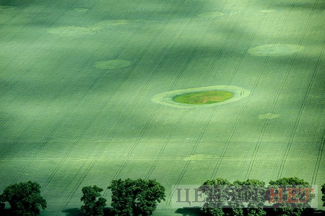 Сельская идиллия, извивающиеся реки и бегущие по полям облака: лето в Украине с высоты птичьего полета 22